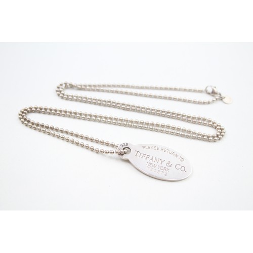 321 - A silver dog tag necklace by Tiffany and Co (31g)