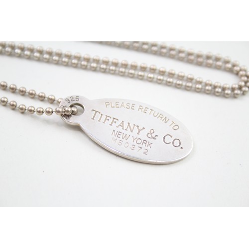 321 - A silver dog tag necklace by Tiffany and Co (31g)