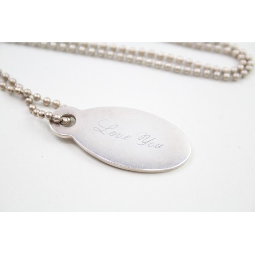 321 - A silver dog tag necklace by Tiffany and Co (31g)