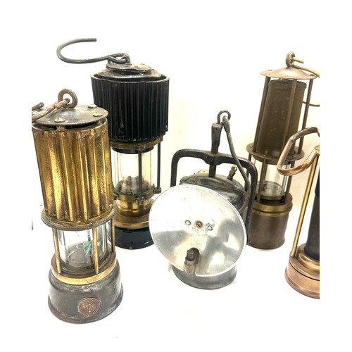 54 - Selection of antique and later miners lamps