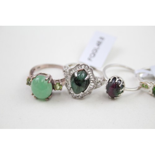 305 - A collection of silver stone set rings including ruby in zoisite (21g)