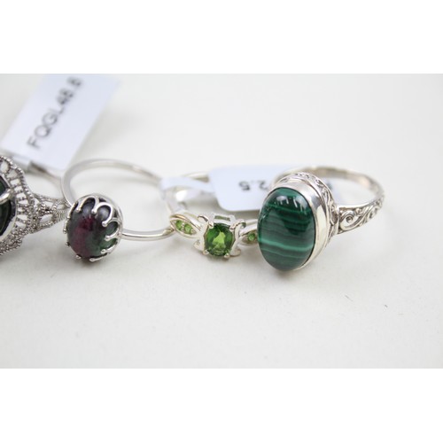 305 - A collection of silver stone set rings including ruby in zoisite (21g)