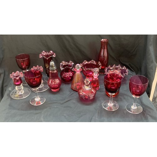 162A - Selection of cranberry glass ware to include Royal Scot candle sticks, pepper shaker, glasses, jug e... 