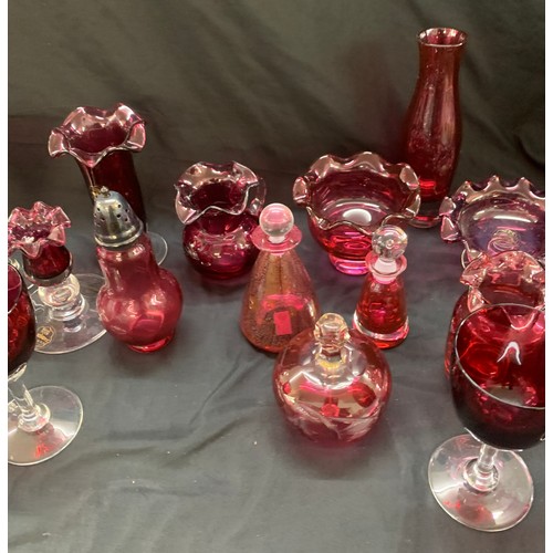 162A - Selection of cranberry glass ware to include Royal Scot candle sticks, pepper shaker, glasses, jug e... 