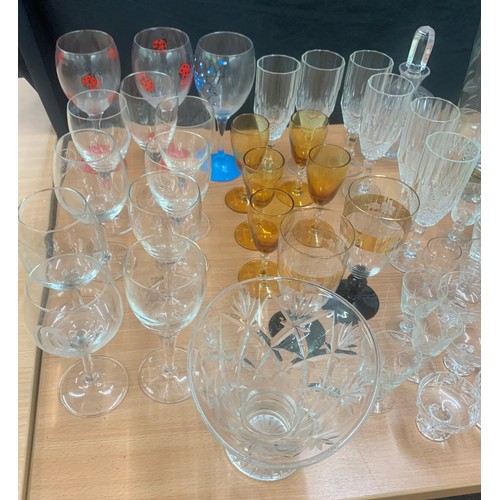 156 - Large selection of coloured and clear glassware to include long vases, bowls, glasses etc