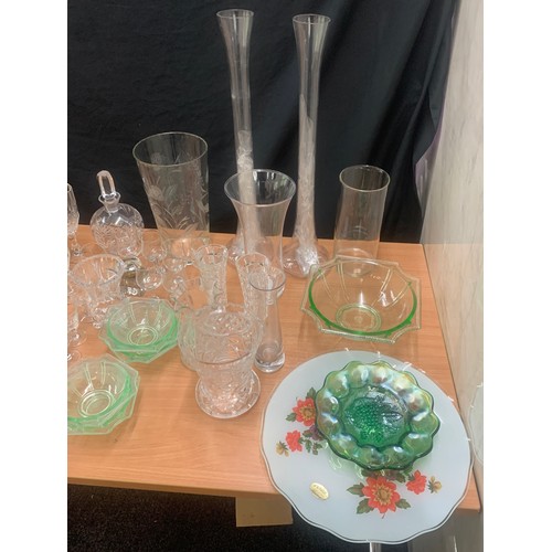 156 - Large selection of coloured and clear glassware to include long vases, bowls, glasses etc