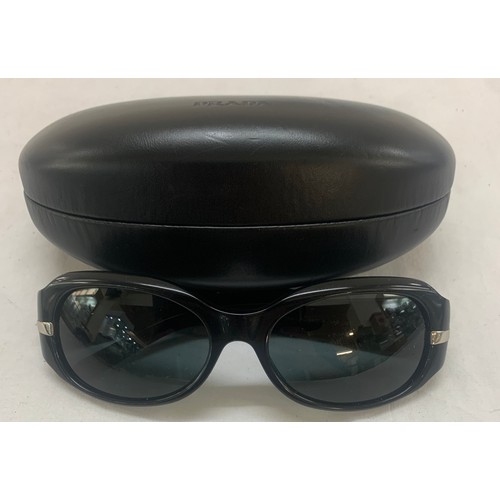 519 - 4 x designer sunglasses to include Chanel, Prada