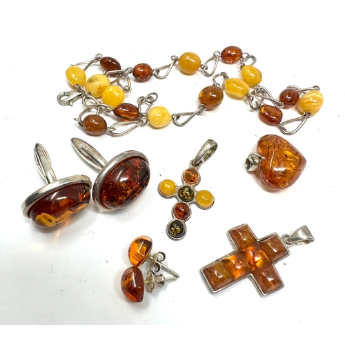 261 - Selection of silver & amber jewellery includes earring cufflinks pendants etc weight 34g