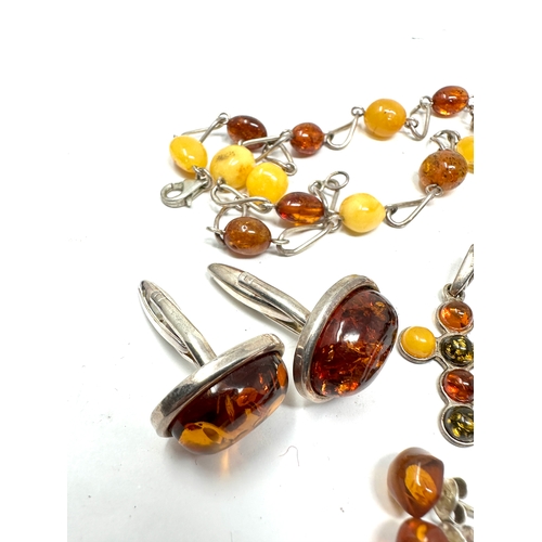 261 - Selection of silver & amber jewellery includes earring cufflinks pendants etc weight 34g