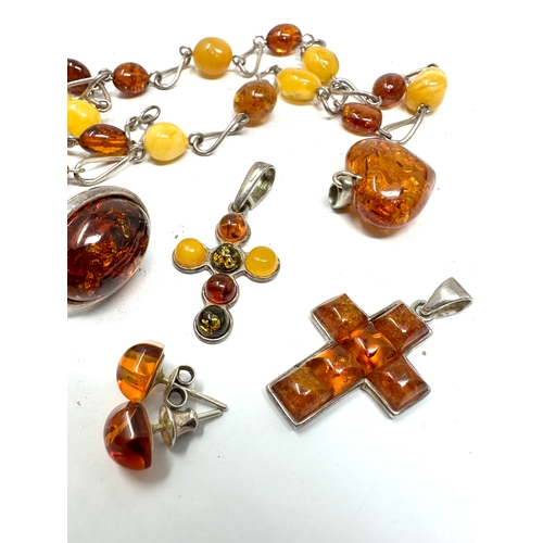 261 - Selection of silver & amber jewellery includes earring cufflinks pendants etc weight 34g