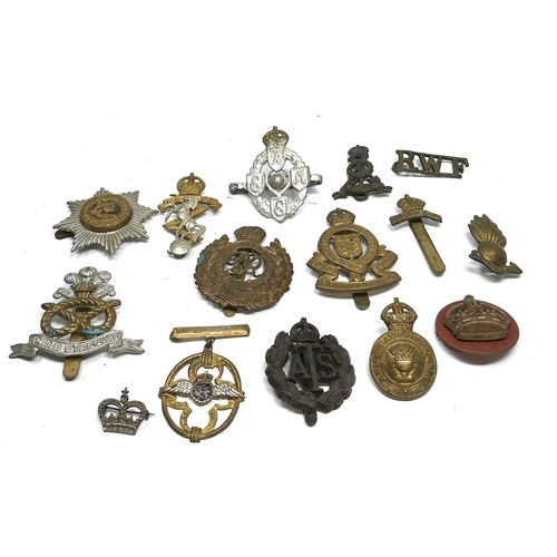 364 - selection of military badges & cap badges