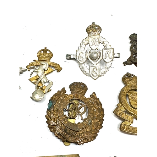 364 - selection of military badges & cap badges