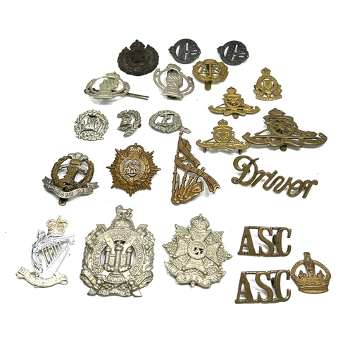 369 - selection of military badges inc cap badges etc