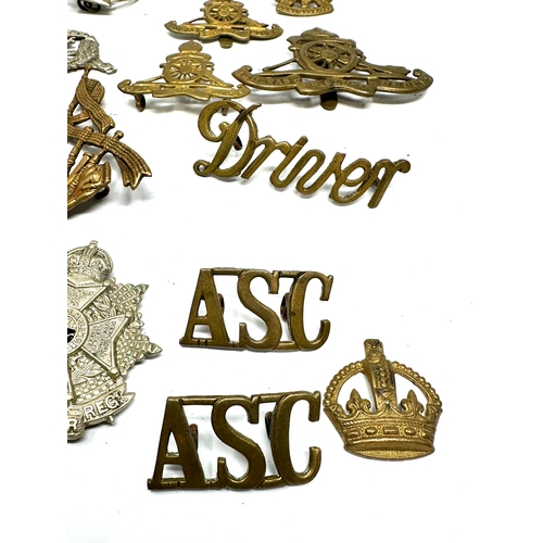 369 - selection of military badges inc cap badges etc