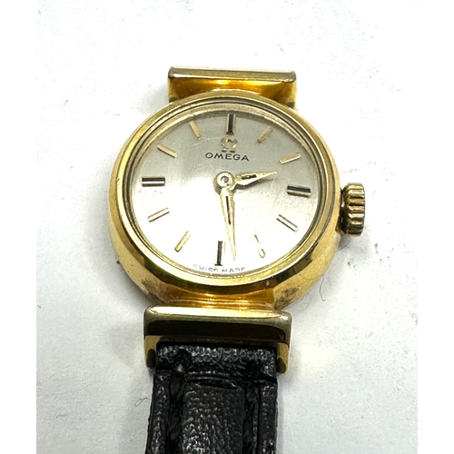 440 - Vintage gold plated Omega ladies wristwatch the watch is ticking needs new strap