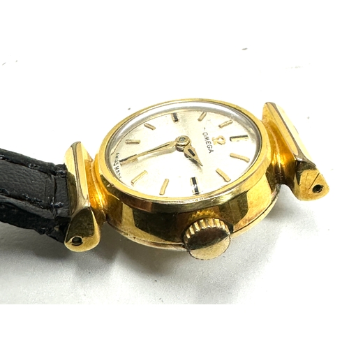 440 - Vintage gold plated Omega ladies wristwatch the watch is ticking needs new strap