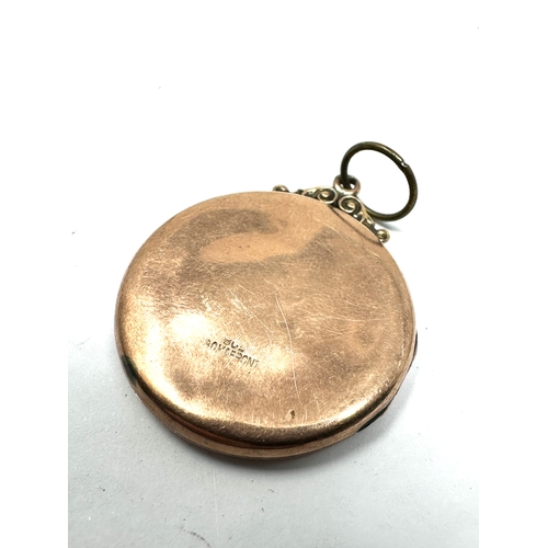 114 - Antique 9ct gold back & front locket measures approx 3.5cm drop by 2.9cm dia