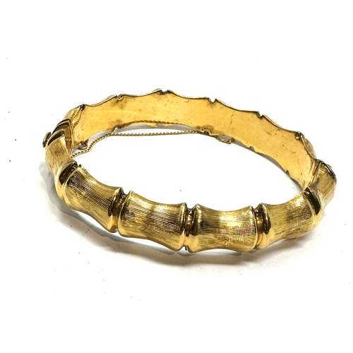 115 - 9ct 1/20th r.g gold bangle weight 20g