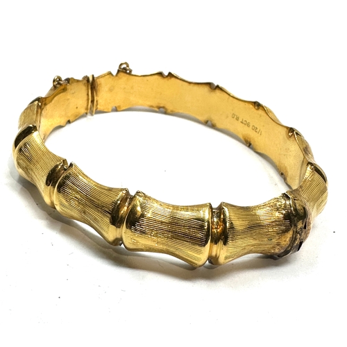 115 - 9ct 1/20th r.g gold bangle weight 20g