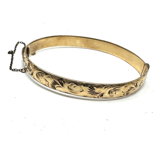 117 - 9ct gold metal core bangle weight 19g