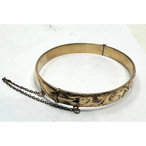 117 - 9ct gold metal core bangle weight 19g