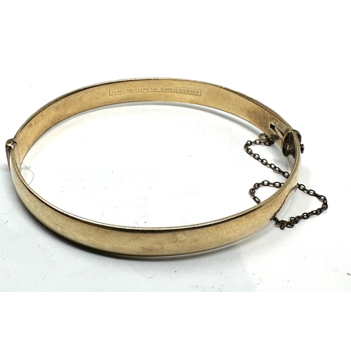 117 - 9ct gold metal core bangle weight 19g