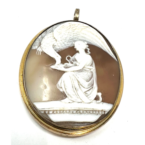 120 - large victorian yellow metal framed cameo pendant locket measures approx 6.5cm drop