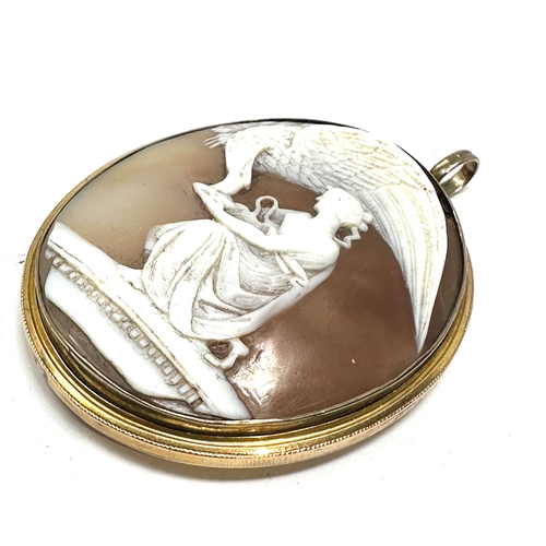 120 - large victorian yellow metal framed cameo pendant locket measures approx 6.5cm drop