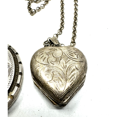 269 - 3 vintage silver lockets largest measures approx 5.6cm 2 having silver neclace chains weight 51g