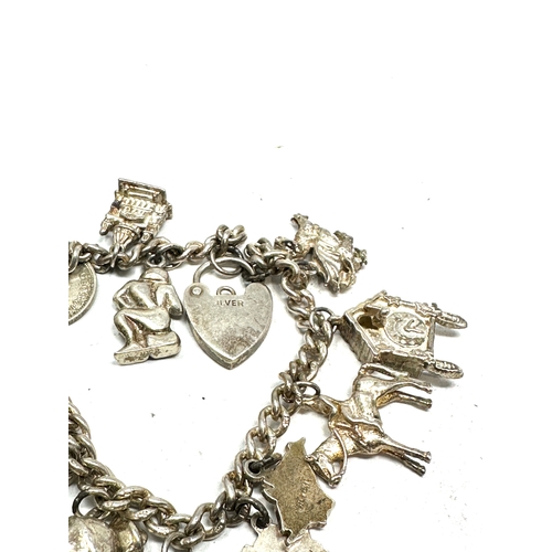 272 - Vintage silver charm bracelet weight 45g