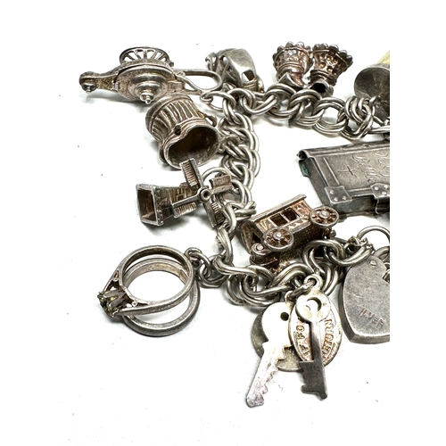 276 - Vintage silver charm bracelet weight 65g