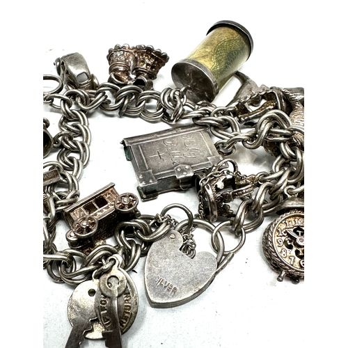 276 - Vintage silver charm bracelet weight 65g