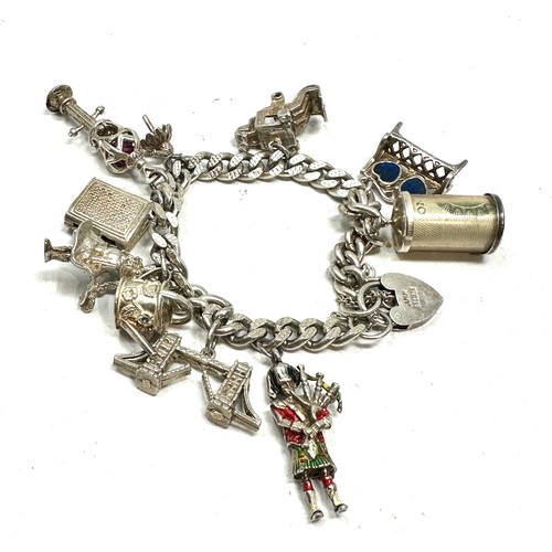 277 - Vintage silver charm bracelet weight 60g