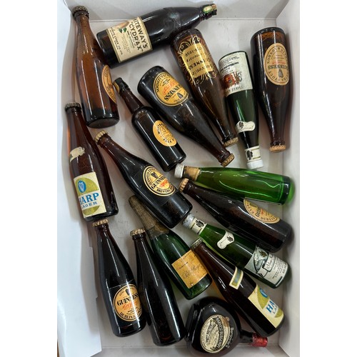 521 - Selection of vintage miniature Guiness bottles