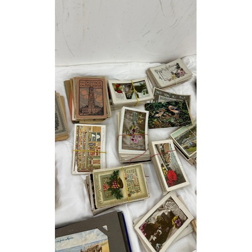 129 - Selection of vintage and later post cards includes postcard album