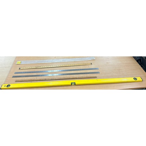 143 - Selection of assorted measuring equipment includes Level, rulers etc