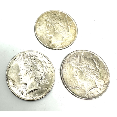 411 - 3 silver liberty one dollars