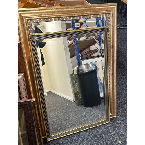 149 - 2 large framed mirrors, largest measures approximately, width 31 inches, Height 44 inches