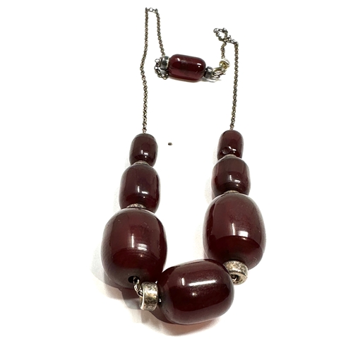 80 - Cherry amber/bakelite bead necklace good internal streaking weight 17g