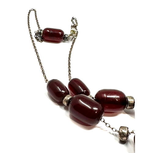 80 - Cherry amber/bakelite bead necklace good internal streaking weight 17g