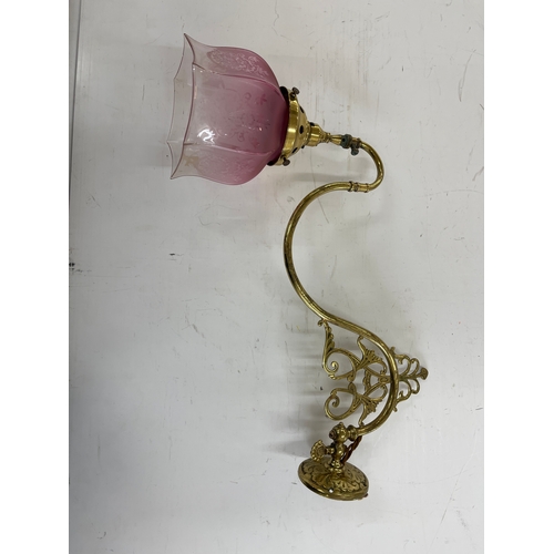 637 - Antique glass shade on a later light fitting