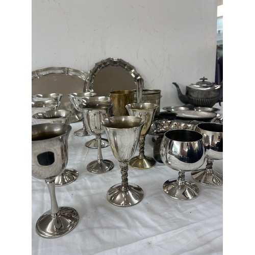 210 - Quantity of EPNS to include goblets, teapots, trays etc