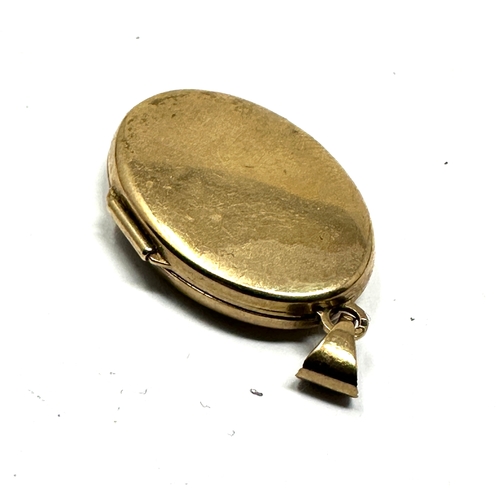 90 - 9ct gold locket measures approx 3.3cm drop weight 3.2g