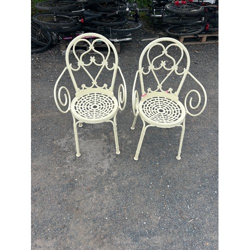86 - Two metal garden chairs