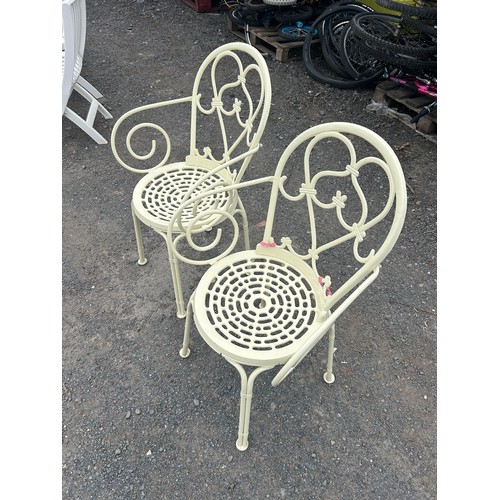 86 - Two metal garden chairs
