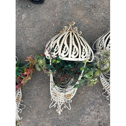 5 - Set of three ornate metal hanging plant stands and three wall brackets measure approx 33 inches tall