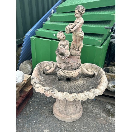 51 - Outdoor concrete garden water feature measures approx 52 inches tall