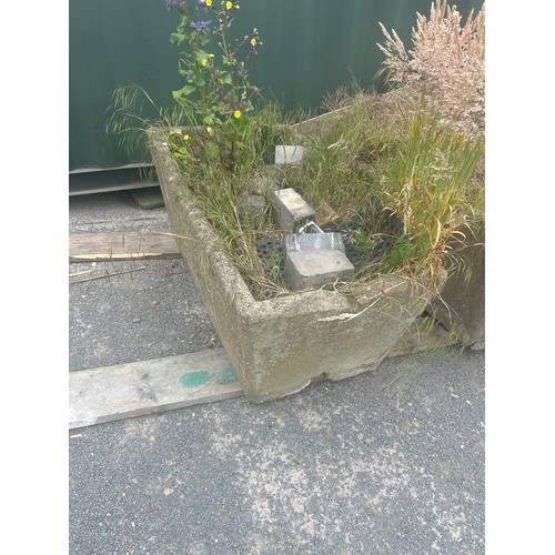 91 - Large over sized concrete garden trough measures approx 22 inches tall by 53 wide and 27 deep