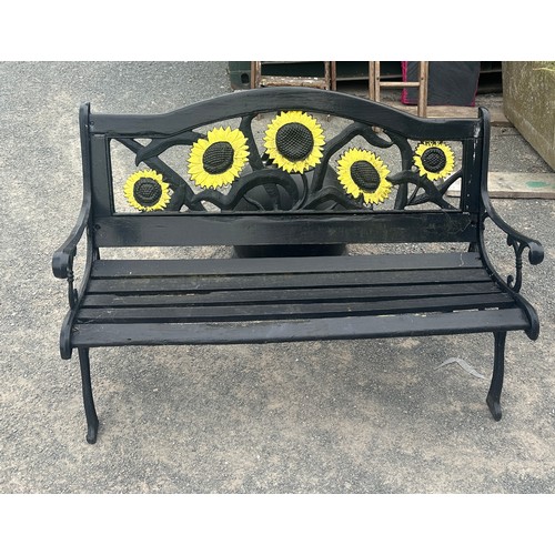 72 - Cast iron sun flower bench, slats in need of repair,  measures approx 32 inches tall, 50 inches long... 