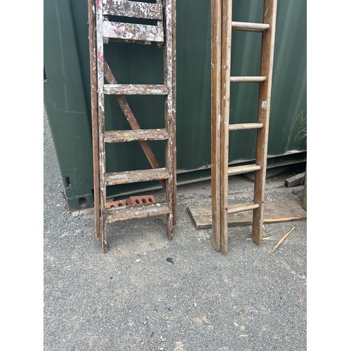 89 - Two sets of wooden ladders